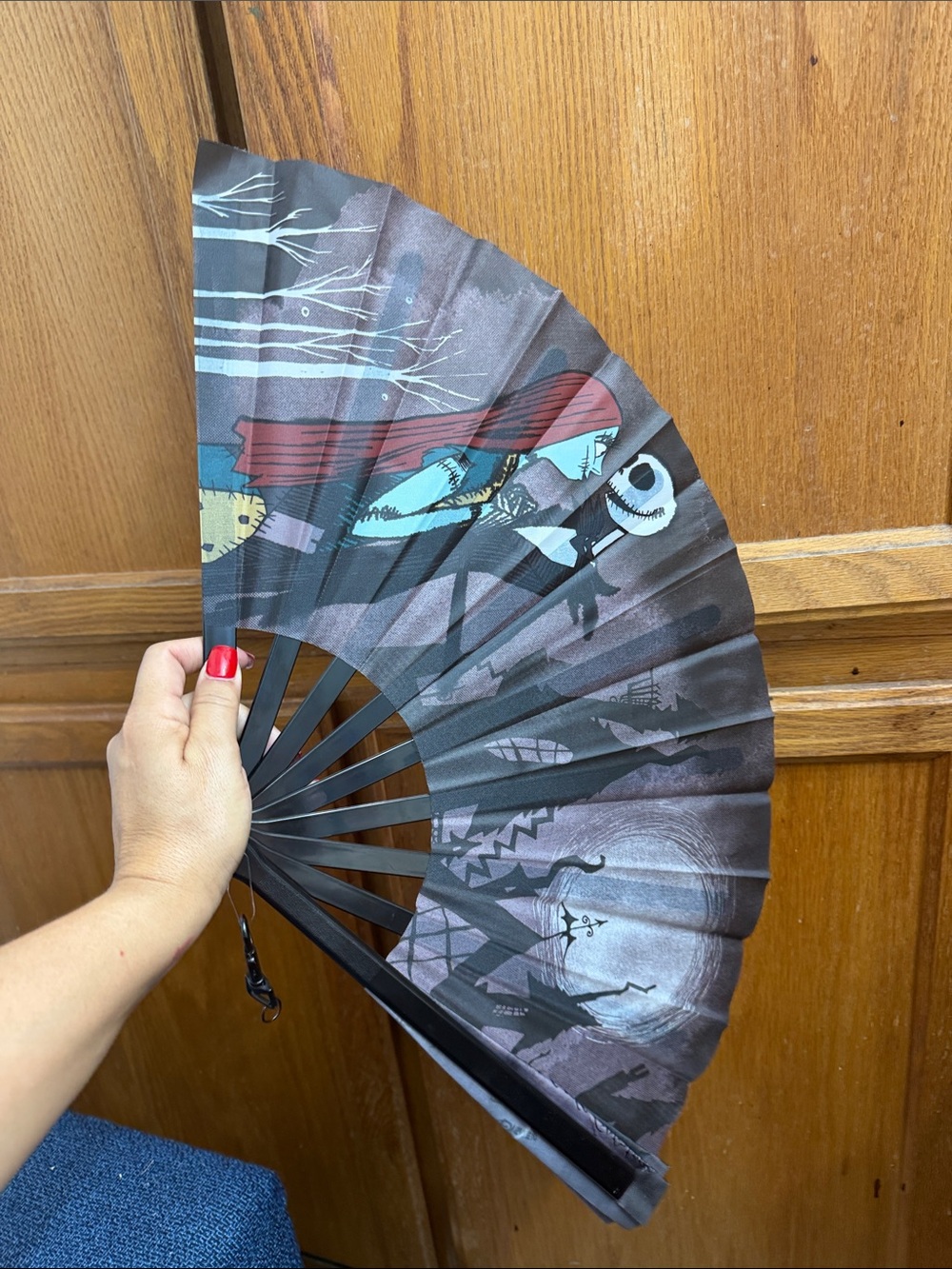 Abanico plegable de Disney con jack y sally bajo la luna